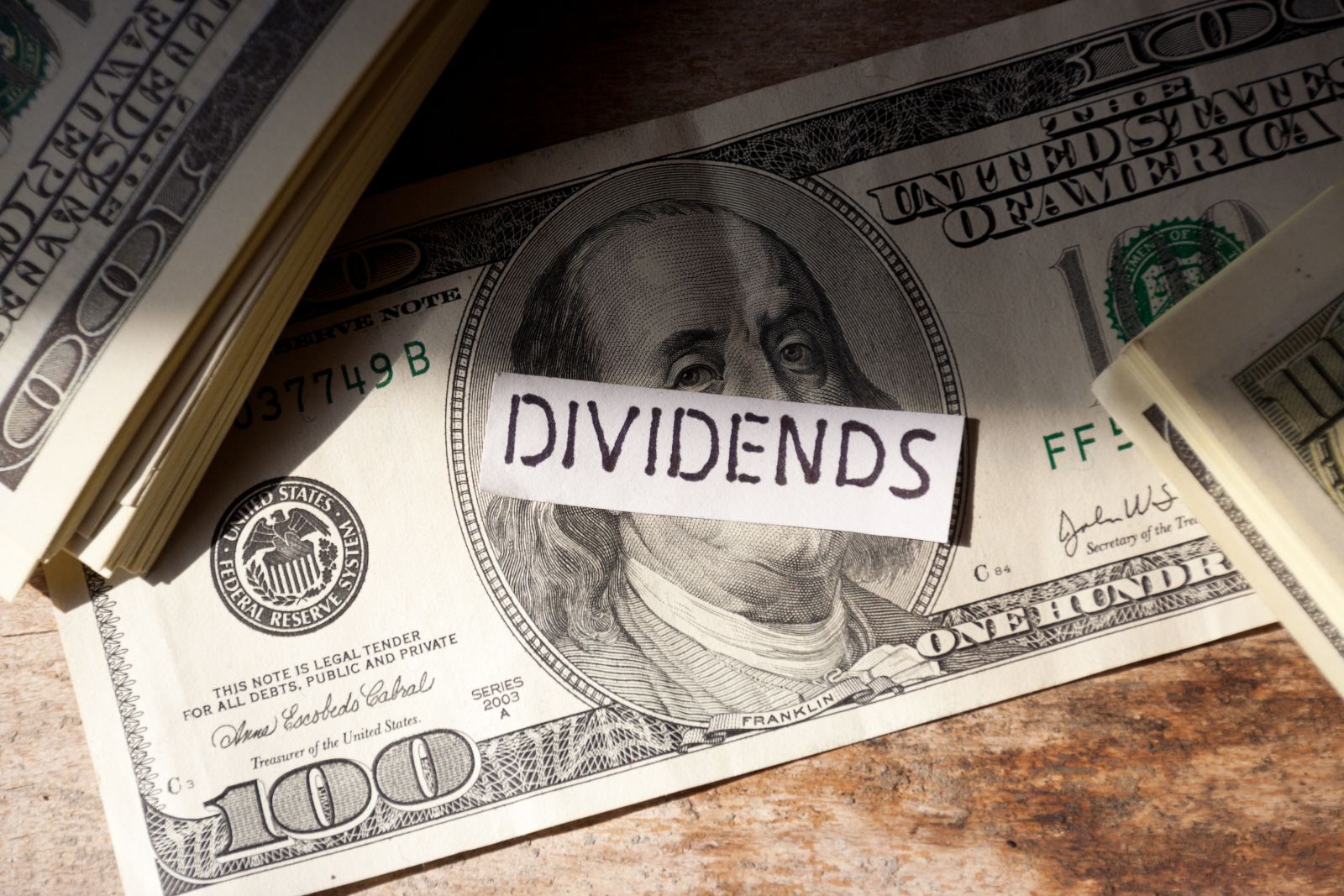 Dividends - Dividends and dollars by MarkgrafAve via iStock