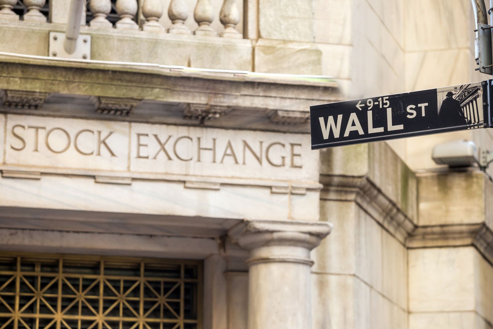 Wall Street - Wall street sign in New York City by f11photo via Shutterstock